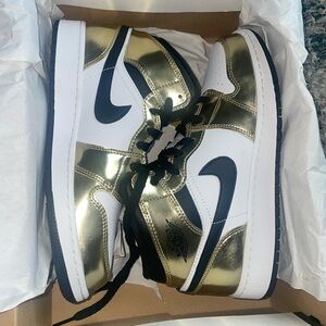 Gold Jordan 1's